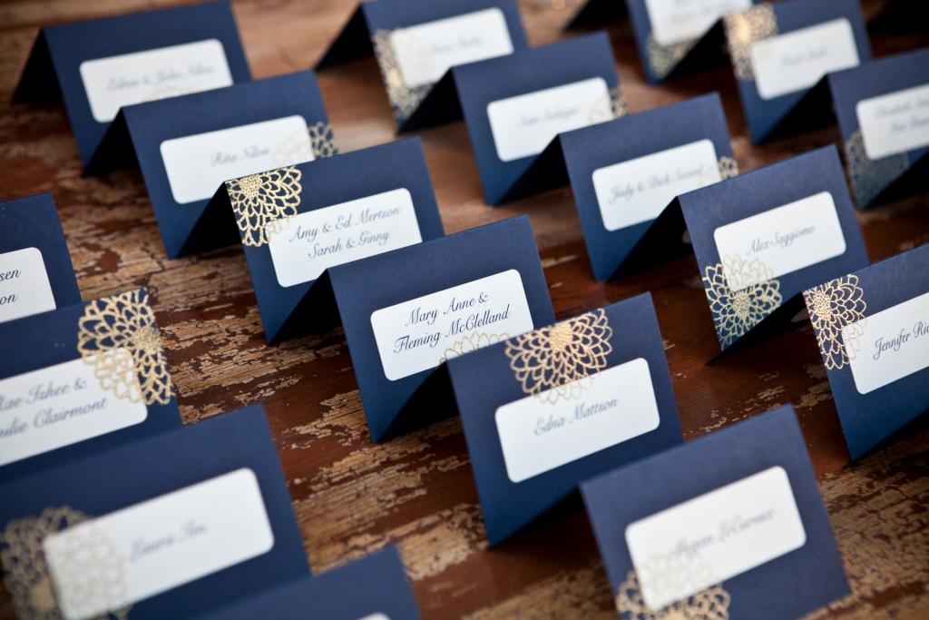 blue place cards with gold design from two paperdolls
