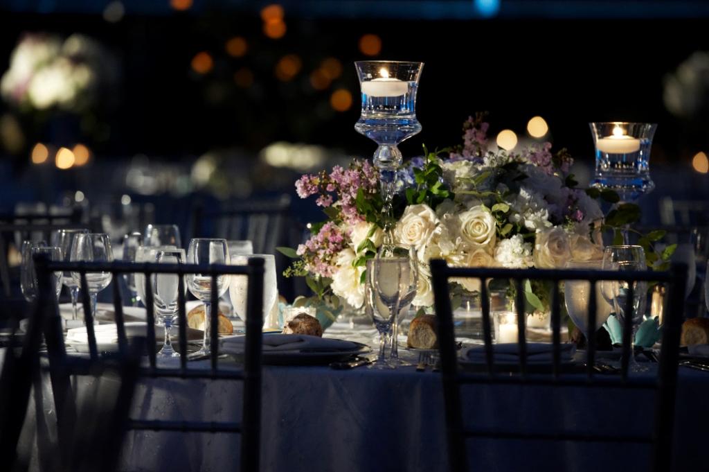 blue and white wedding theme decor floating candles evantine design loews hotel philadelphia