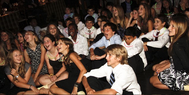 kids watching a bar mitzvah montage at phoenixville foundry