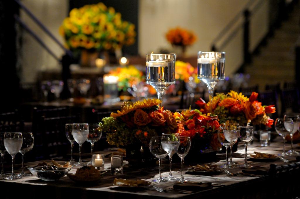 rectangular feast tables with orange flowers for bar mitzvah philadelphia evantine susan beard
