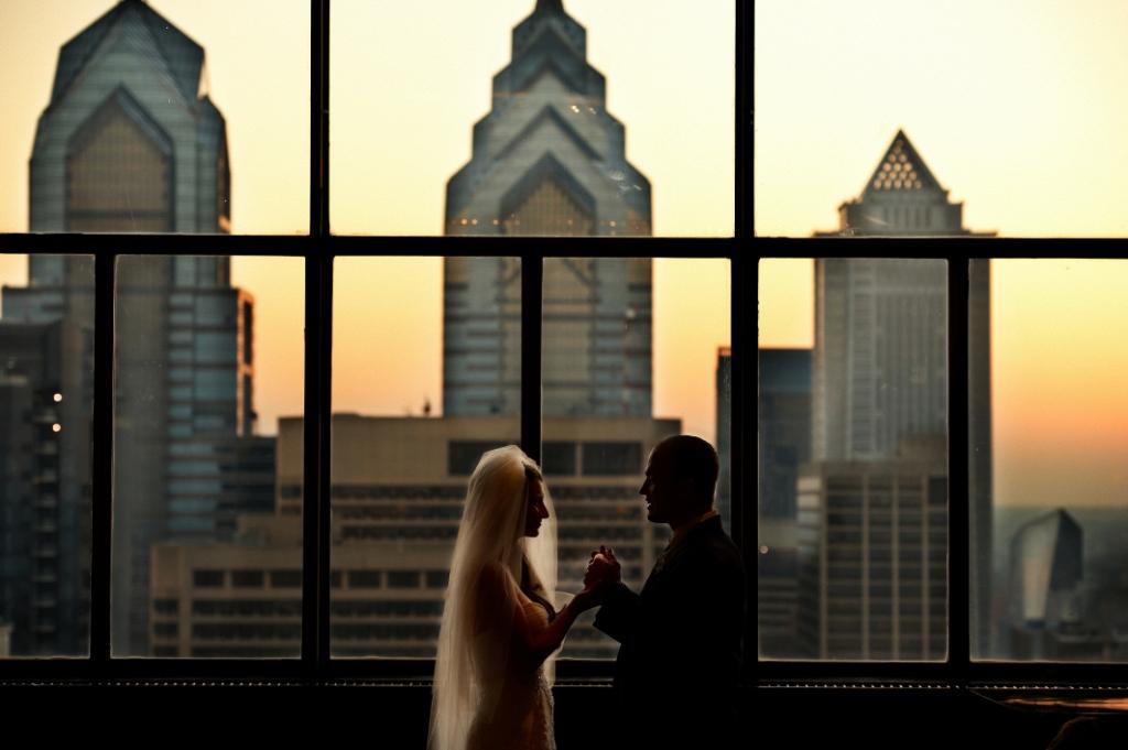 sunset wedding photo philadelphia skyline evantine design