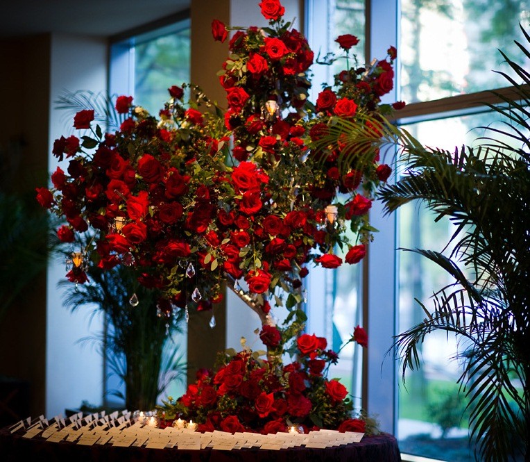 Red flowers red roses floral tree place card table evantine design philadelphia weddings