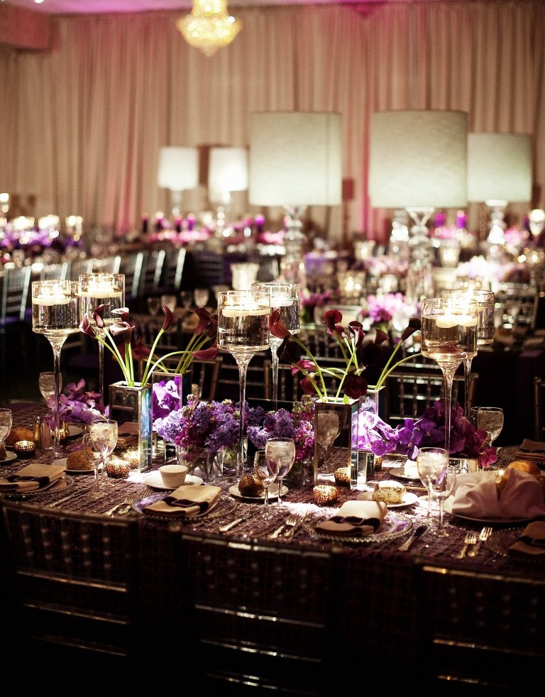 chandeliers white lamps floating candles white drape purple orchids philadelphia weddings