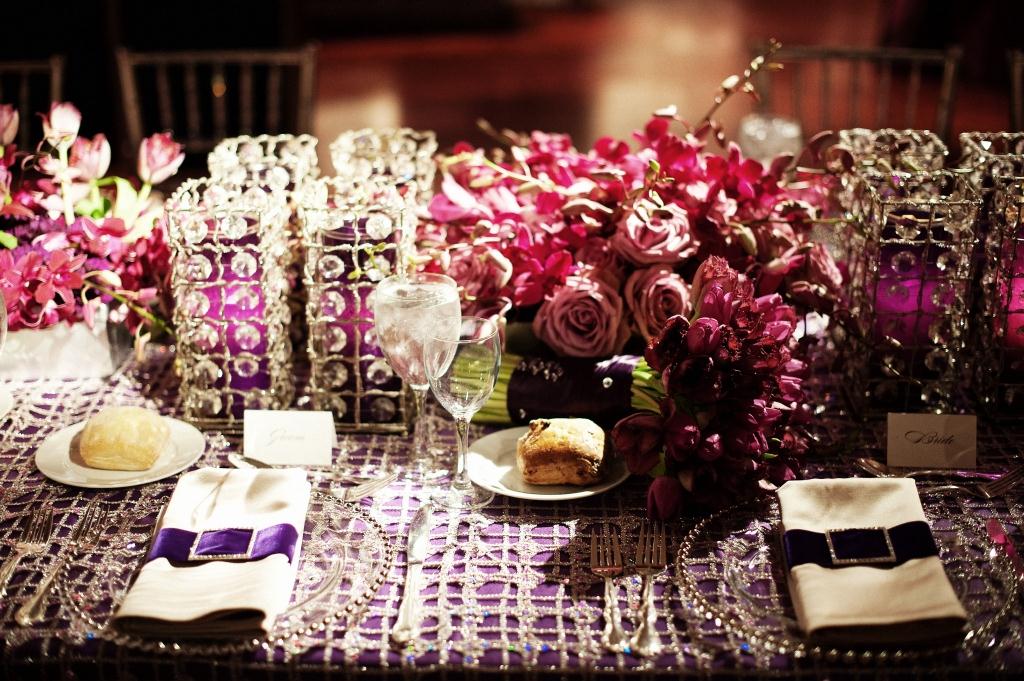 crystal candle holders purple flowers glamorous weddings evantine design