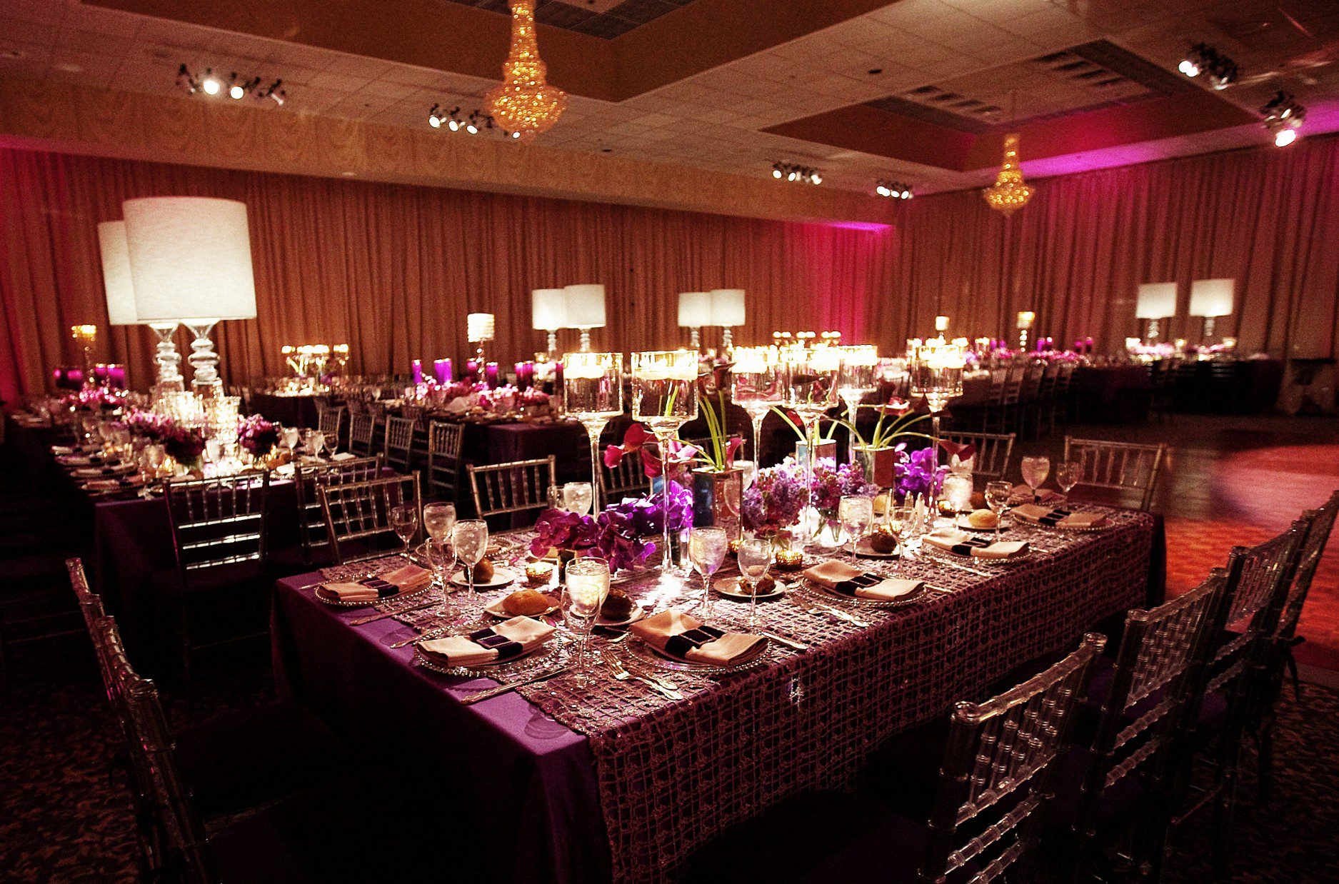 rectangular dinner tables white lamps purple lighting modern weddings evantine design