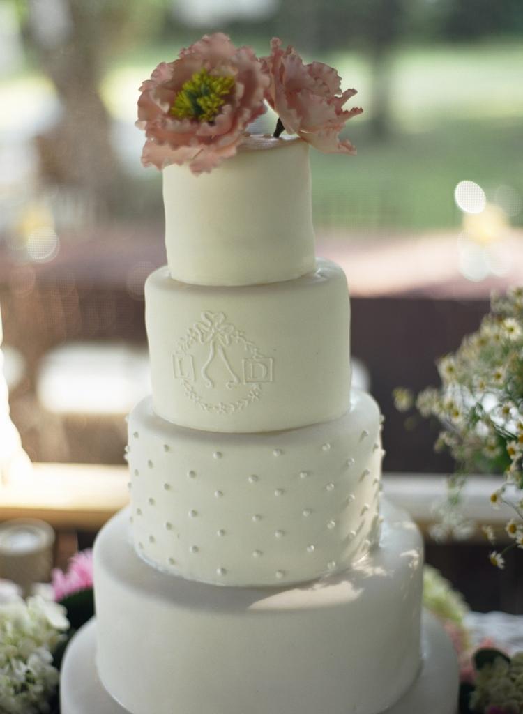 white fondant wedding cakes pink sugar peonies blind embossed logo