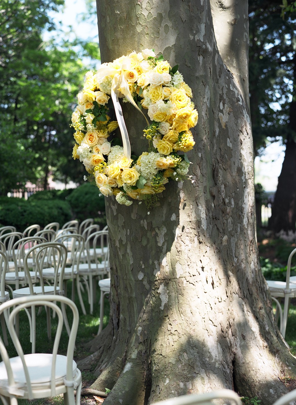 Yellow rose wreath on a tree wedding decor beach weddings