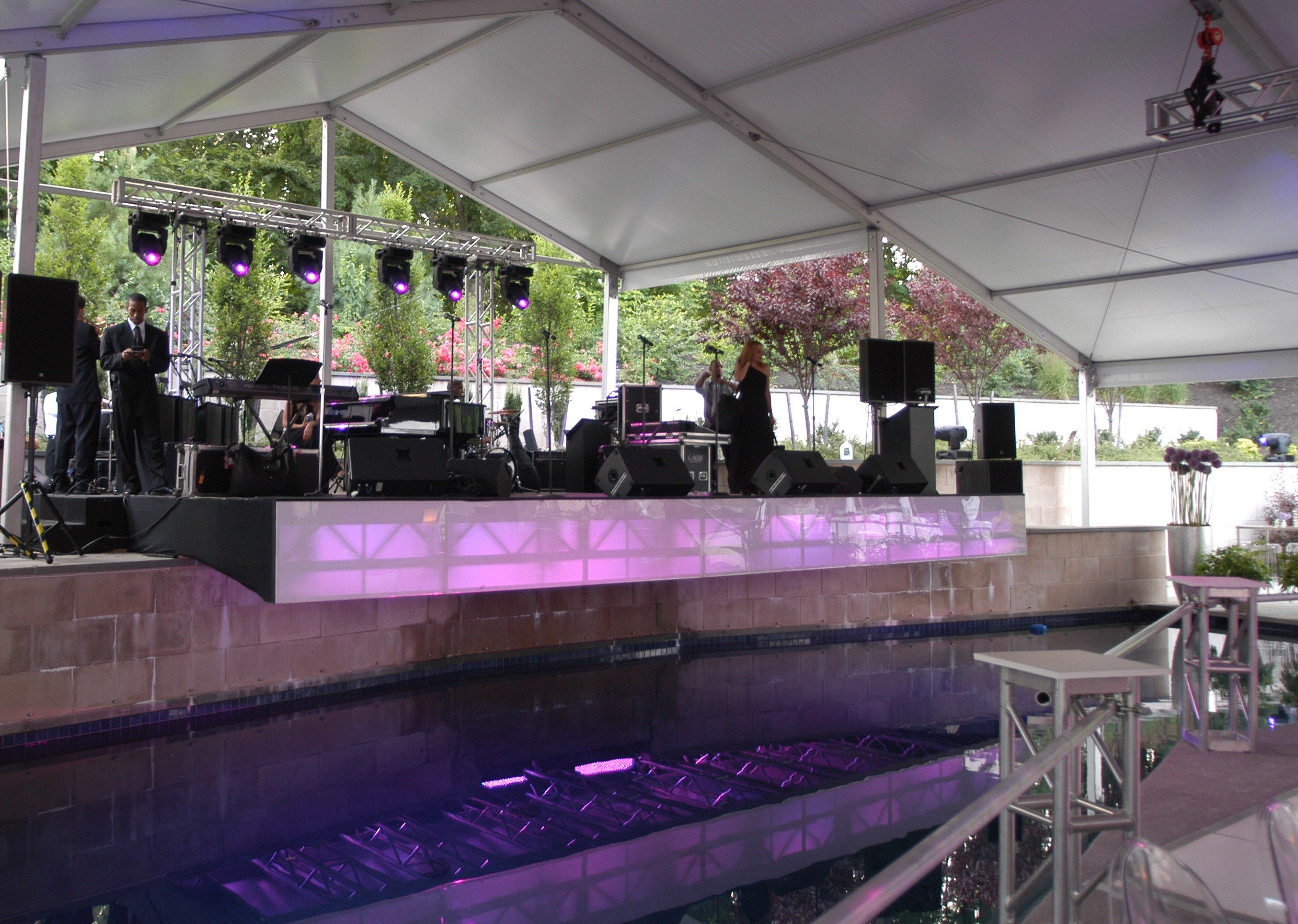 Cantilevered Stage Built Over a Pool Evantine Design EventQuip