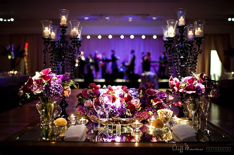 sweetheart tables for weddings purple flowers black chandeliers