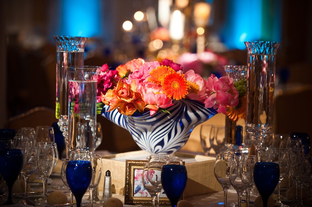 orange and pink floral centerpiece philadelphia weddings evantine design