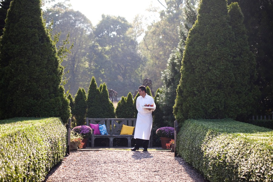 Cocktails in the Walled Garden Andalusia Estate Peter Callahan Evantine Design