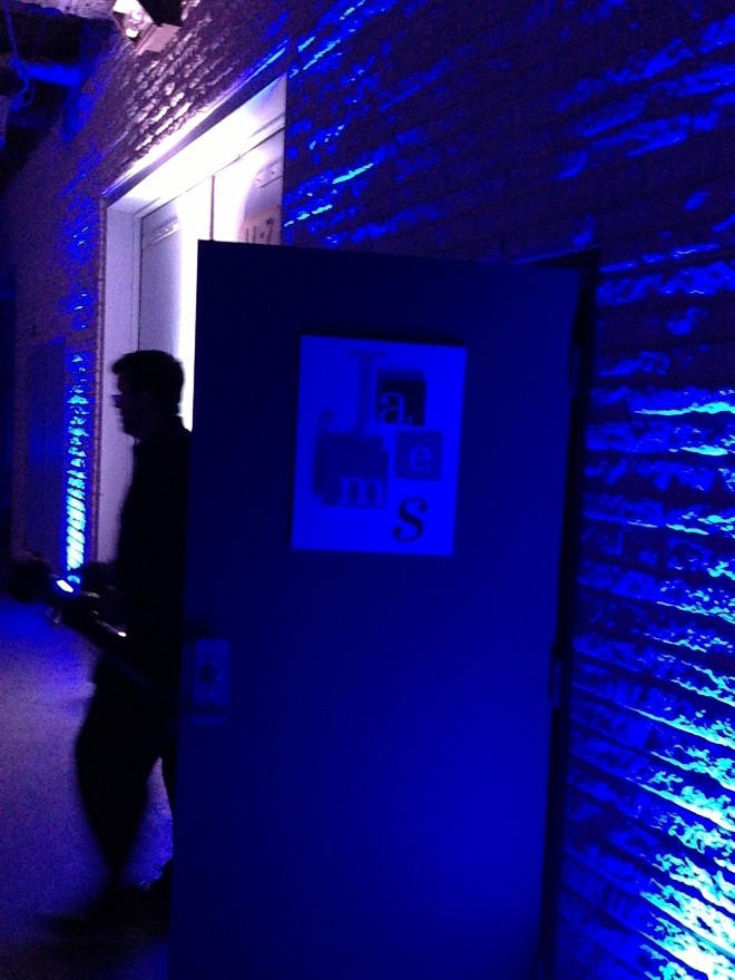 Secret Entrance to the Party lit up in dramatic blue lighting.