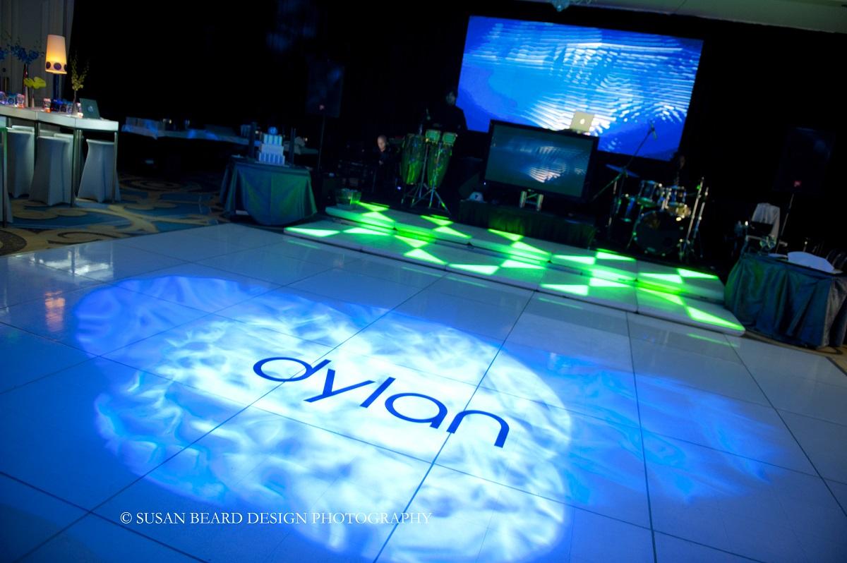 dance floor monograms white dance floor with blue lighting effects evantine designe eventions productions