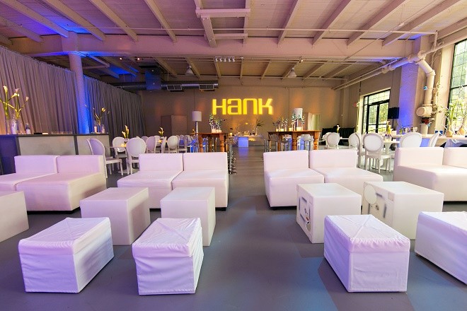 modern white lounge mitzvah with raw wood blue lighting evantine designn moulin loft space philadelphia 40