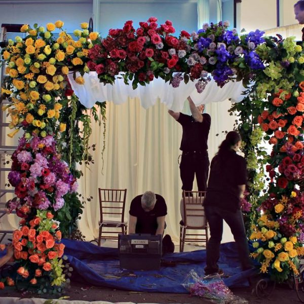 Evantine Design Team installing a chuppah Floral Designers Philadelphia Event design Philly