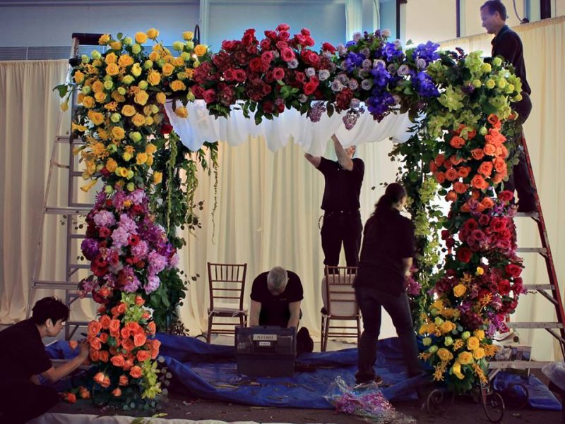 Evantine Design Team installing a chuppah Floral Designers Philadelphia Event design Philly