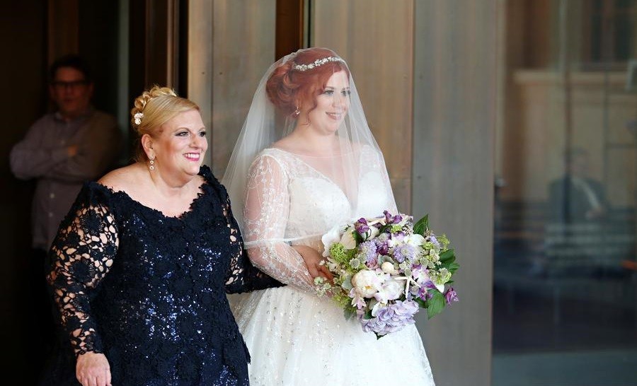 mother of bride walks bride down aisle philadelphia weddings 